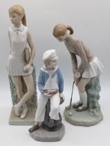3 LLADRO'S - BOY HOLDING YACHT, GIRL PLAYING GOLF AND GIRL PLAYING TENNIS