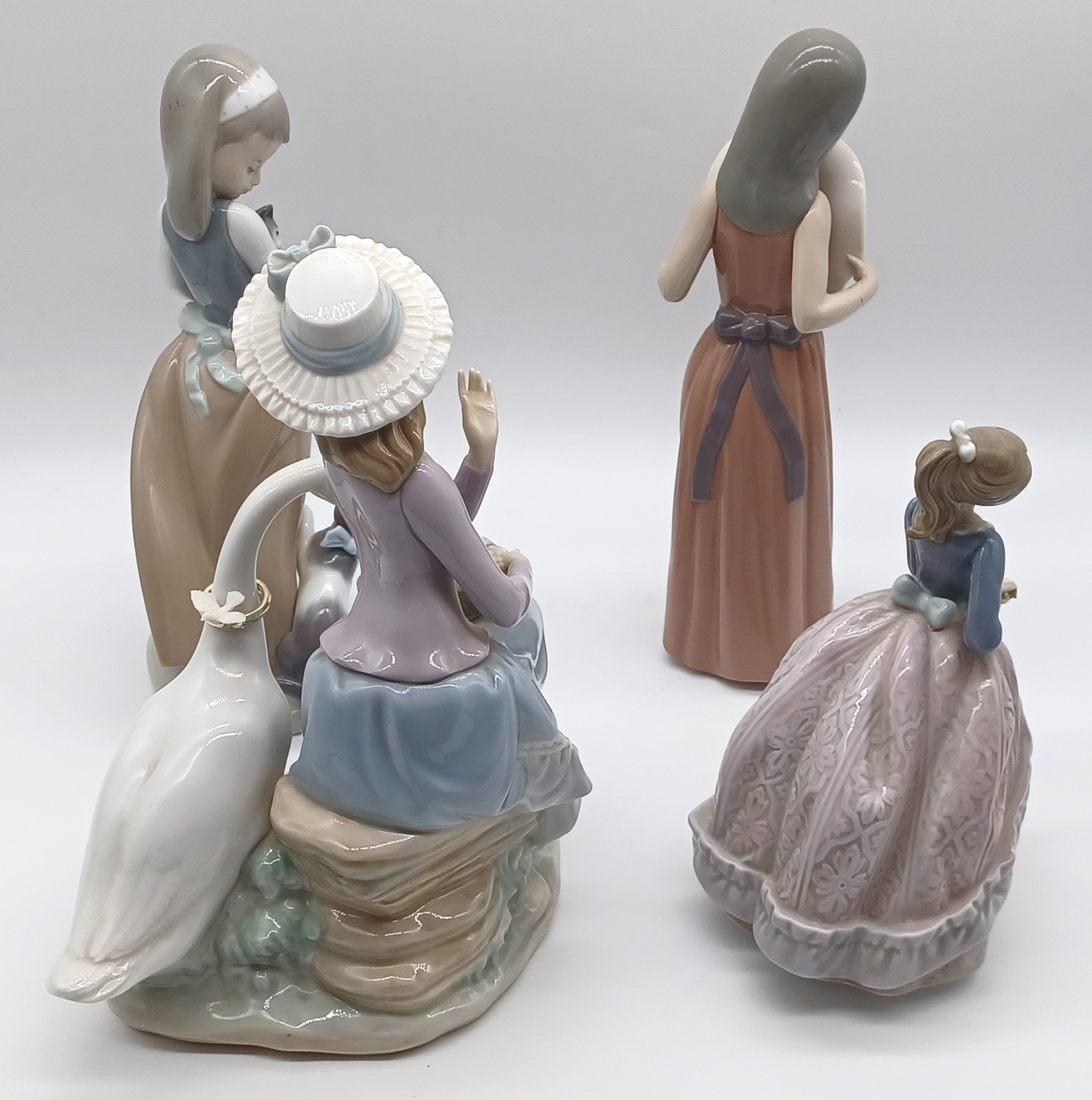 4 LLADRO - GIRL WITH GOOSE, GIRL HOLDING AN UMBRELLA, GIRL HOLDING A HAT, GIRL HOLDING KITTENS - Image 2 of 3