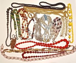 BAG OF COSTUME BEADED NECKLACES LARGE RED BEADS AND BLACK JETS ETC.