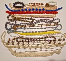 BAG OF BEADED NECKLACES AND BRACELETS