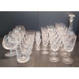 A  SUITE OF WATERFORD 'LISMORE' PATTERN 34 IN TOTALS AND A DECANTERCRYSTAL GLASSES COMPRISING