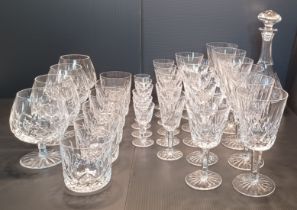 A SUITE OF WATERFORD 'LISMORE' PATTERN 34 IN TOTALS AND A DECANTERCRYSTAL GLASSES COMPRISING