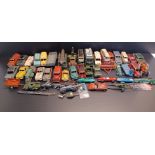 A COLLECTION OF PLAYWORN DINKY TOYS