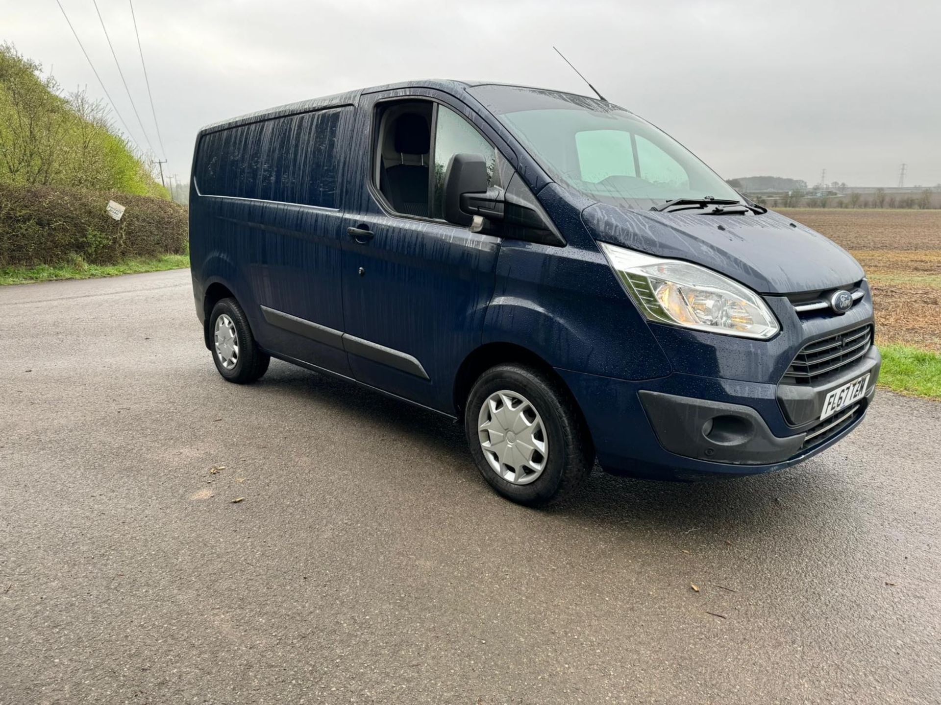 2017/67 REG FORD TRANSIT CUSTOM 290 TREND 2.0 DIESEL MANUAL BLUE PANEL VAN, SHOWING 2 FORMER KEEPERS