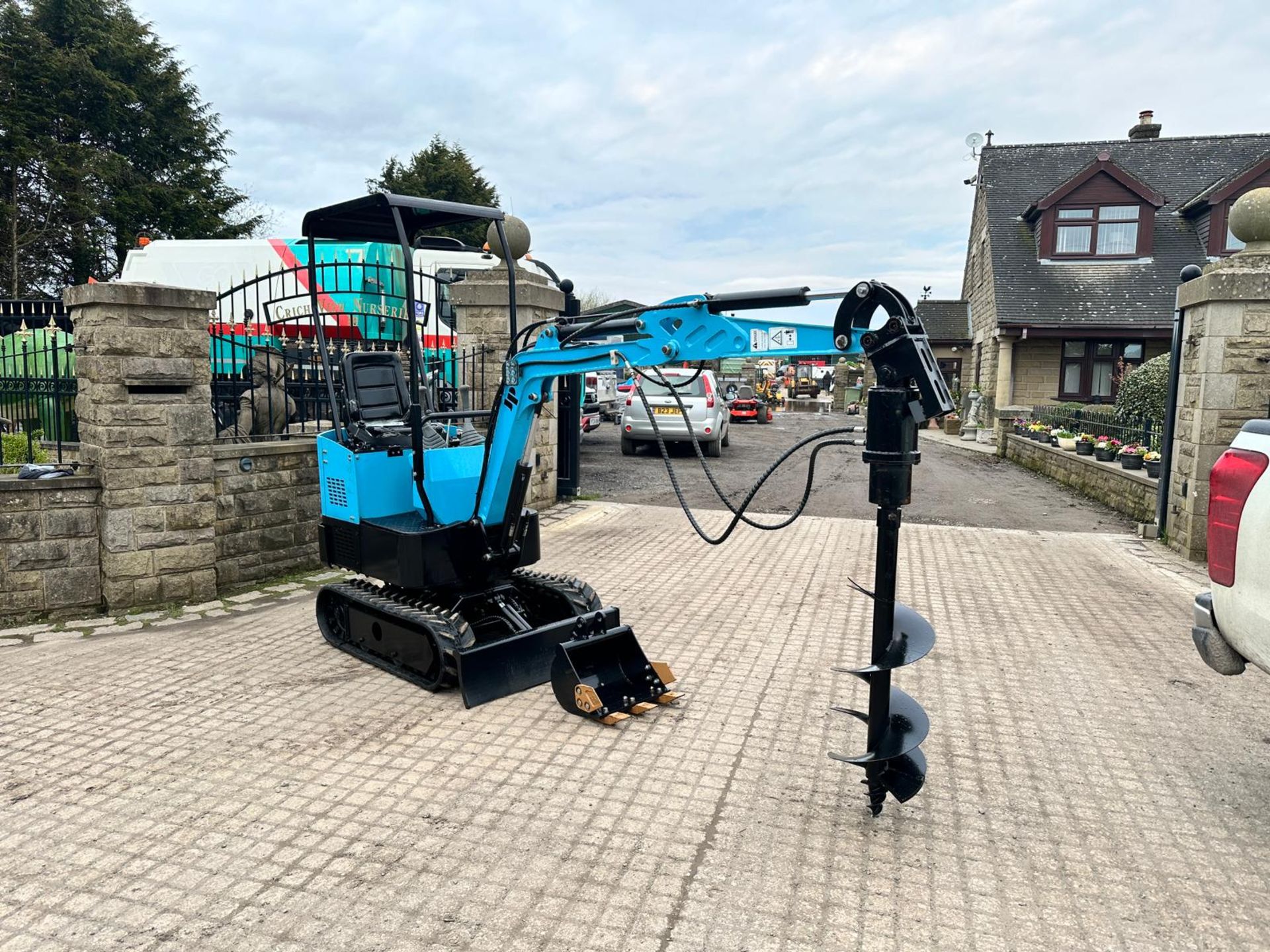 NEW/UNUSED JPC HT12 MINI EXCAVATOR WITH NEW/UNUSED 12” POSTHOLE BORER AND BUCKET *PLUS VAT*