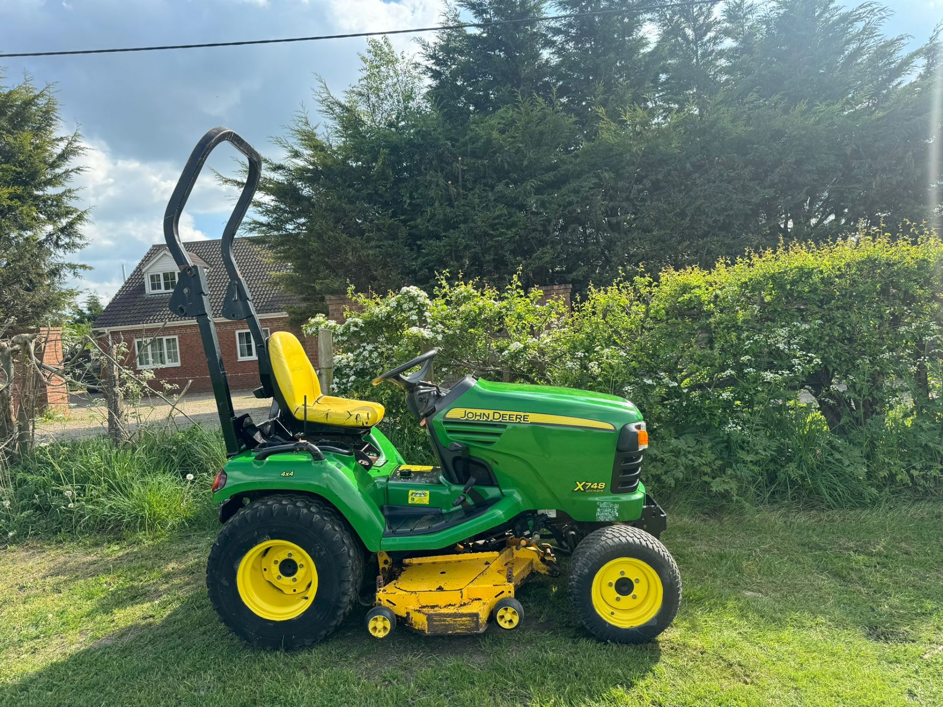 JOHN DEERE X748 RIDE ON LAWN MOWER 4x4 *PLUS VAT*