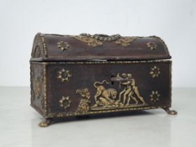 An 18th Century Italian dome topped metal Casket with relief brass designs of Gladiatorial scenes