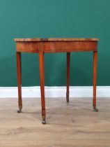 An Edwardian satinwood Occasional Table of rounded rectangular form with floral inlaid and