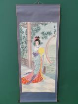 A 20th Century Chinese Wall Hanging in watercolour depicting a standing Female in dress on a