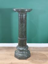 A mottled green, pedestal three-piece marble Column on octagonal base , A/F, 1ft 6in Diam