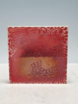 A 20th Century pottery Tile in the style of William de Morgan with ruby Lustre kylin design, 6 in