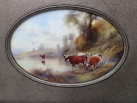 A Royal Worcester Plaque painted river landscape with cattle, signed H Stinton, the oval aperture