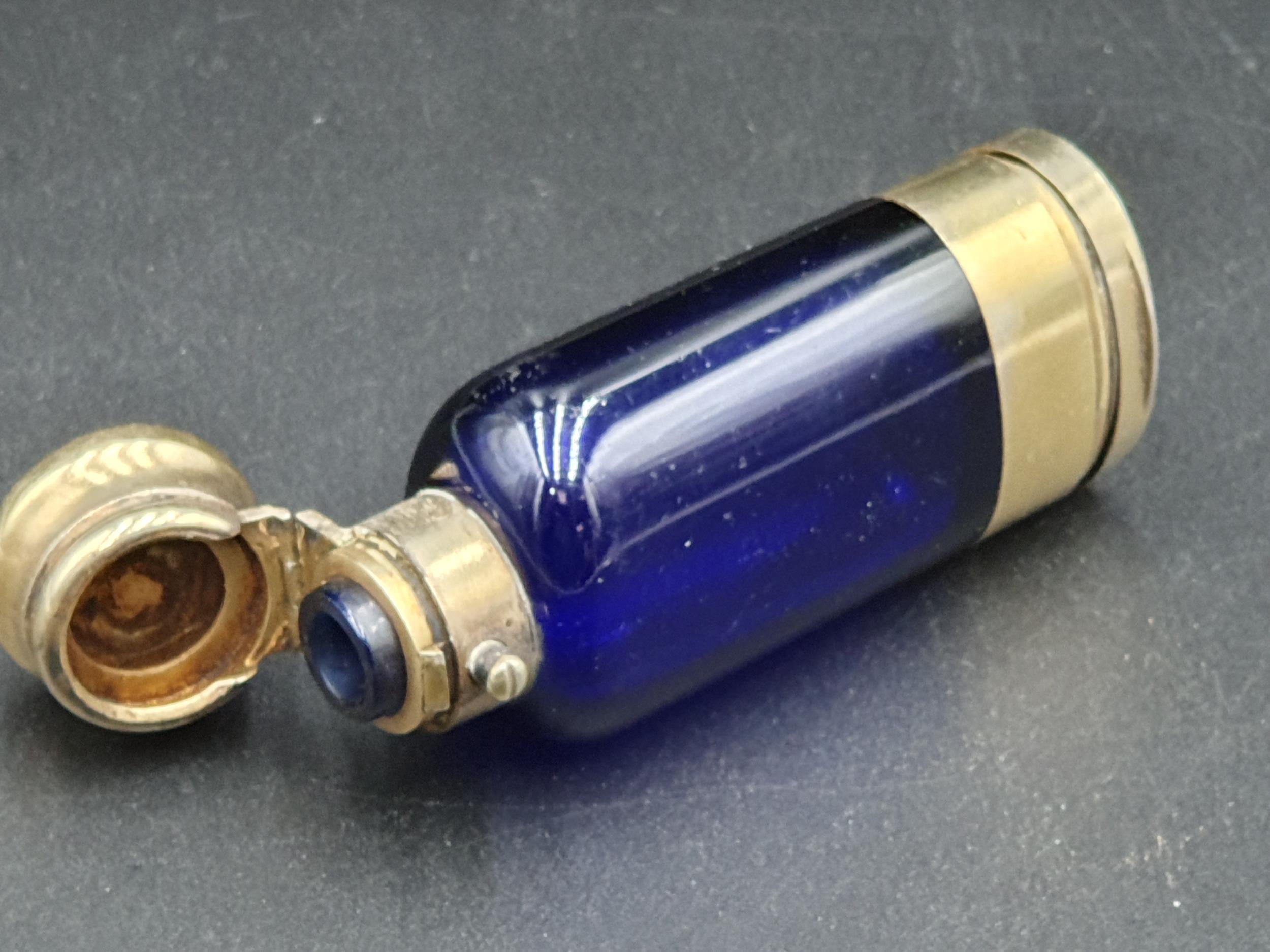 A Victorian silver-gilt mounted blue glass Scent Bottle/Vinaigrette with finely scroll pierced and - Image 10 of 10