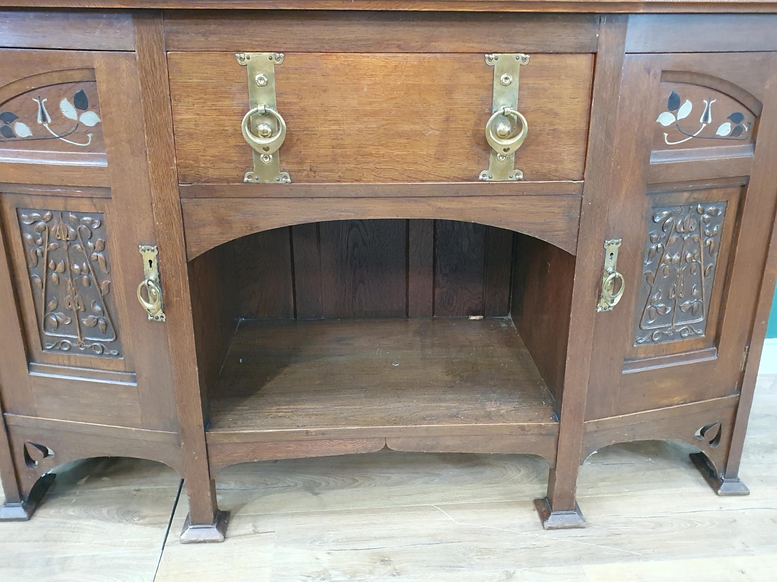 An oak Art Nouveau Mirrorback Sideboard, the upper section with a pair of inlaid doors, the base - Image 7 of 7