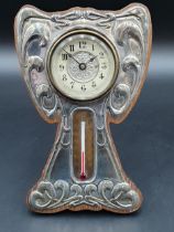 An Edward VII Art Nouveau silver mounted Clock and Thermometer with embossed design, Birmingham