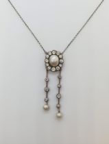 An early 20th Century Pearl and Diamond Negligée Necklace the principle baroque pearl within a frame