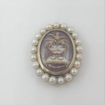 An early Clasp for six row necklace having enclosed picture of an urn decorated mother of pearl