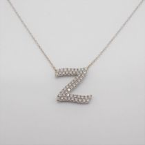A Diamond Necklace formed as the letter 'Z' pavé-set throughout brilliant-cut stones on fine chain