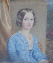 ENGLISH SCHOOL CIRCA 1850. Portrait miniature of a Lady, half length, wearing a blue Dress, a pillar