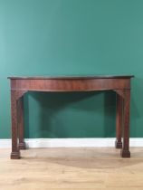 An Irish mahogany Serpentine Serving Table raised on chamfered squared and blind fret carved