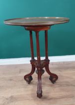 A French Occasional Table by Grohé, Paris, the quarter veneered circular top with brass gallery