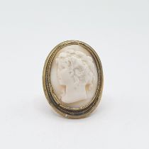 A carved shell Cameo Ring of bust in profile, stamped 9ct, ring size G/H, approx 3.80gms