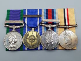 Four; Campaign Service Medal with 'Northern Ireland' Clasp, NATO Medal with 'Former Yugoslavia'