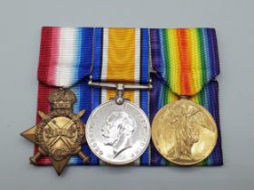 Three; WWI 1914-15 Star, British War and Victory Medals engraved to 203104 Warrant Officer Joseph