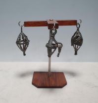 Three Luristan Pendants (possibly bell cages)