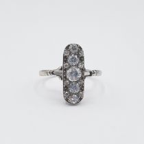 An early 20th Century Diamond five stone Ring pavé-set a column of graduated old-cut stones