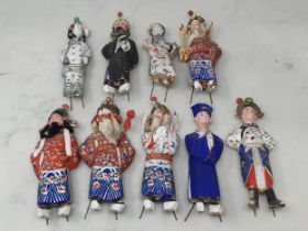 Nine antique Chinese clay Dolls with moving heads dressed in traditional costume, some A/F 6in H