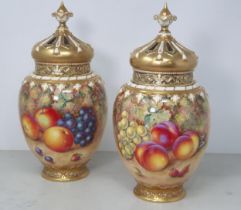 A pair of Royal Worcester Pot Pourri lidded Vases with inner cover and outer lid having pierced