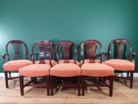 A set of eight 19th Century mahogany Dining Chairs the oval framed backs having pierced splats