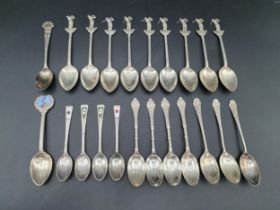 Nine silver Teaspoons with golfing figure finials, Birmingham 1936-8, two A/F, four George V