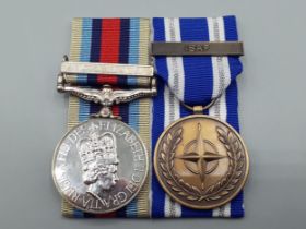 Two; Operational Service Medal with 'Afghanistan' Clasp and NATO Medal with 'ISAF' Clasp engraved to