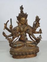 A gilt bronze Figure of a ten armed Goddess Buddha Statue with coloured stone decorations, bearing