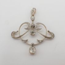 An Art Nouveau Diamond Pendant the openwork plaque millegrain-set old-cut stones within rose-cut