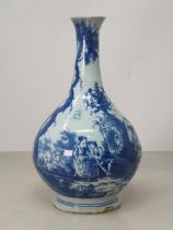 An antique blue and white Delftware Vase, decorated with figures in Landscape with ornate Tree. 10.