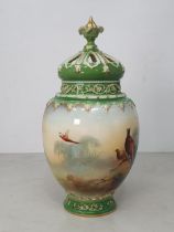 A Royal Worcester Pot Pourri Vase having inner and outer covers, painted with Pheasant figures in