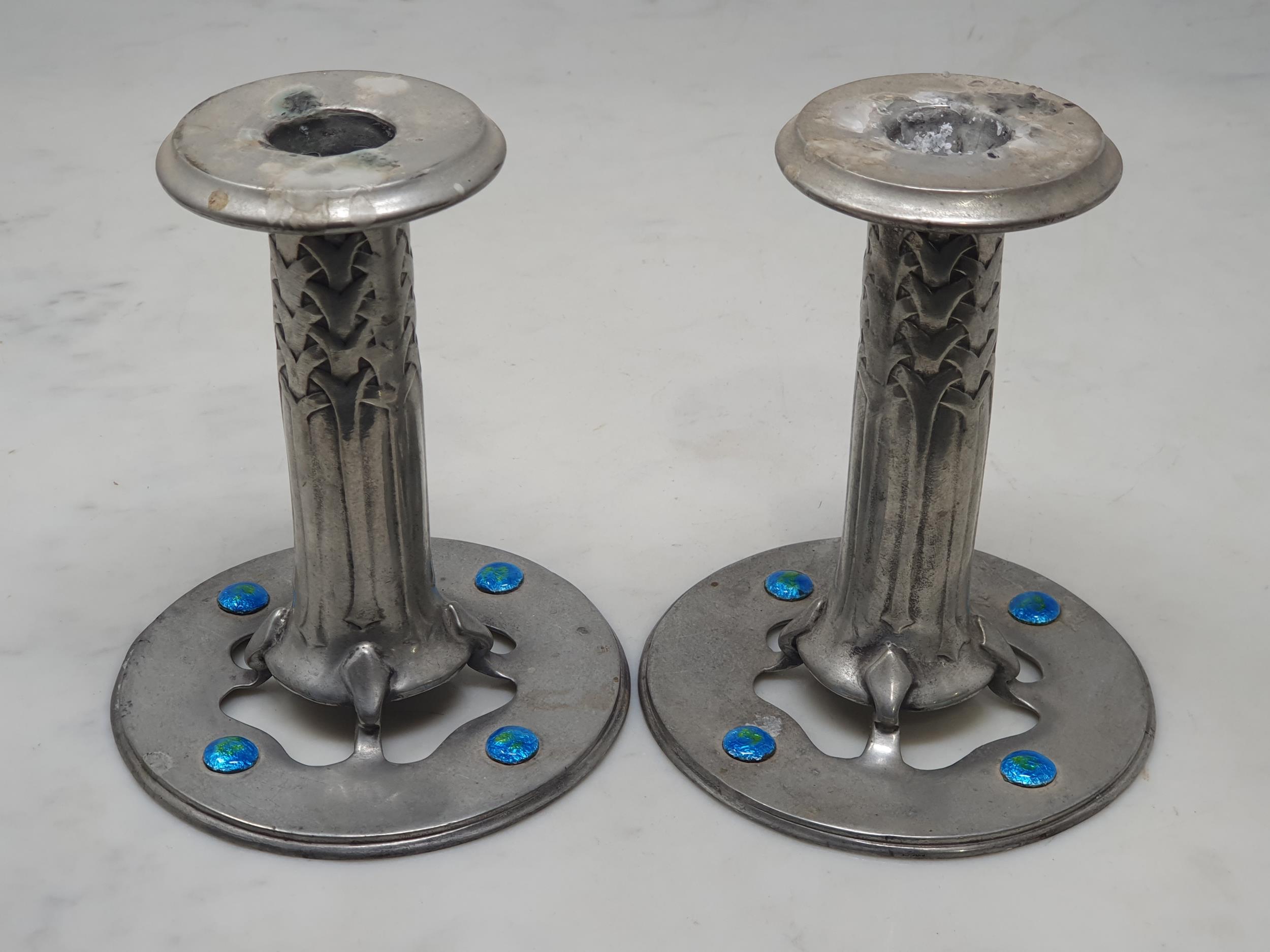 A pair of Arts and Crafts "Liberty and Co - Tudric Pewter" Squat Candlesticks with stylised - Image 2 of 13