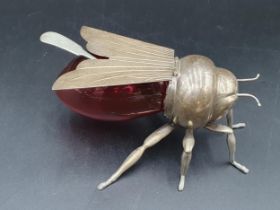 A plated mounted pink glass Honey Jar in the form of a bee with engraved wings, 6in, Mappin & Webbs,