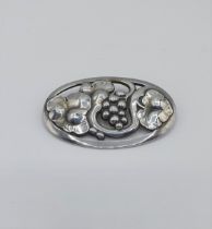 A Georg Jensen Danish silver Brooch of fruiting vine in oval frame number 177 B, approx 5.5cms wide