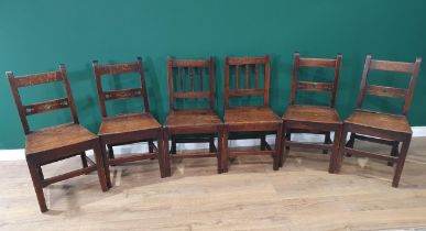 A matched set of six antique oak Chairs with solid seats on squared supports and stretchers