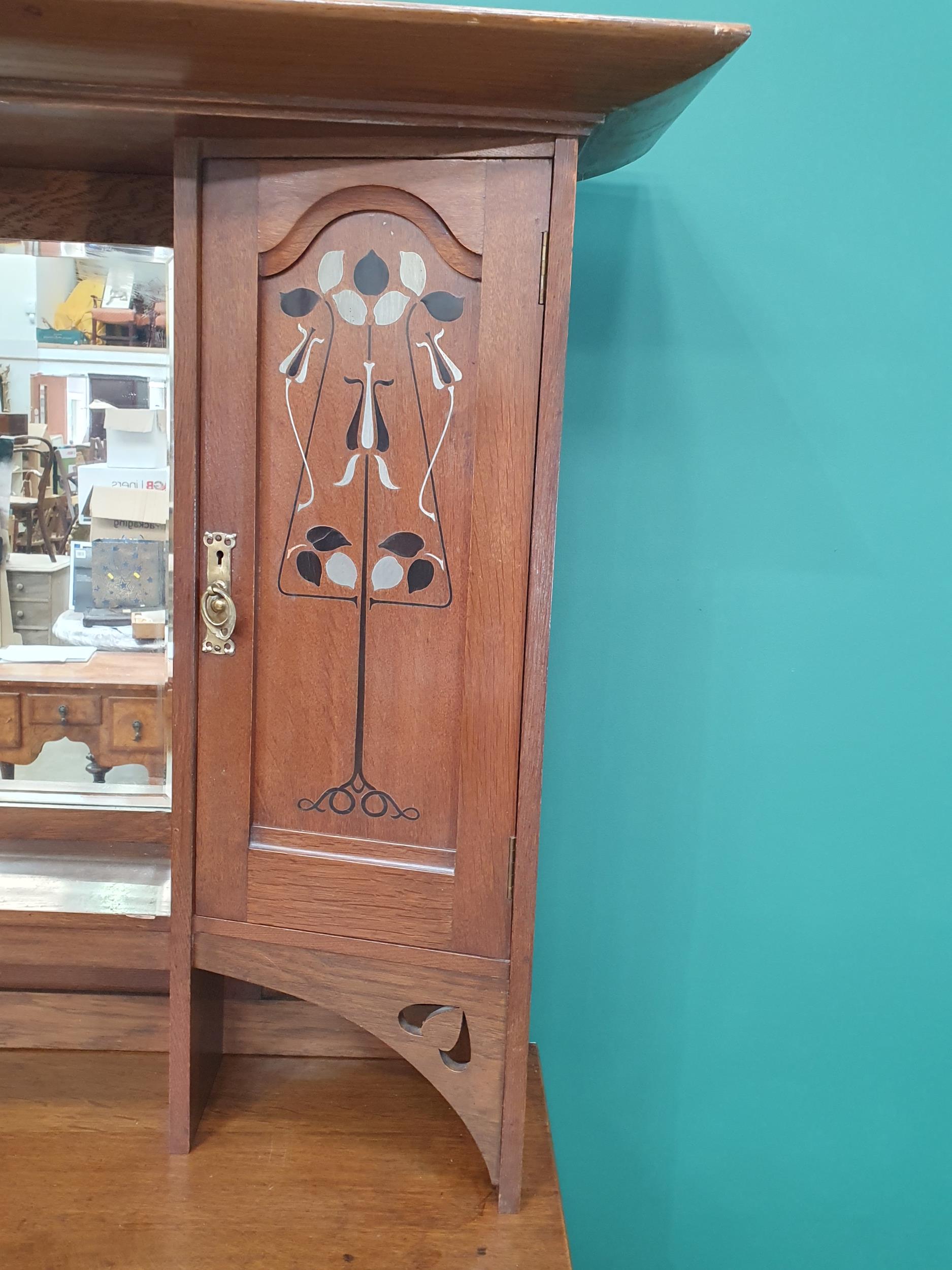 An oak Art Nouveau Mirrorback Sideboard, the upper section with a pair of inlaid doors, the base - Image 4 of 7