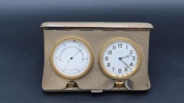 A George V silver cased Travelling Clock and Aneroid Barometer with engine turning to the case,