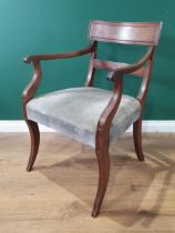 A Regency mahogany Elbow Chair with curved top rail, scroll arms, blue upholstered stuff over seat