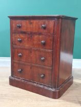 A Victorian mahogany Sewing Cabinet frieze drawer above fall front decorated as three drawers