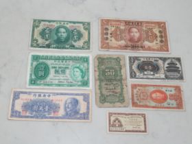 A small collection of Chinese and Hong Kong Banknotes to include a Bank of China 1925 50 Cents and