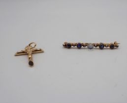 A Moonstone, Diamond and Sapphire Bar brooch having central moonstone, four sapphire cabochons and