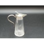 A Victorian silver mounted and lidded glass Toddy Flask or miniature Claret Jug of tapering form